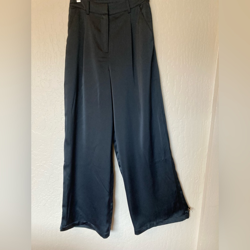 House of Harlow black satin-like palazzo pants.
